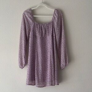 Long sleeve skater dress in purple with white and yellow floral design